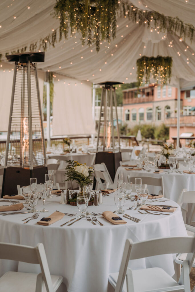 elegant outdoor tented reception with twinkly lights