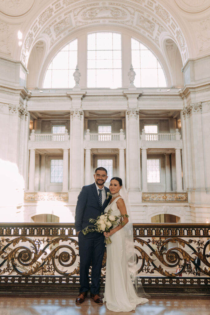 bride and groom at the gorgeous San Francisco city hall for their elopement