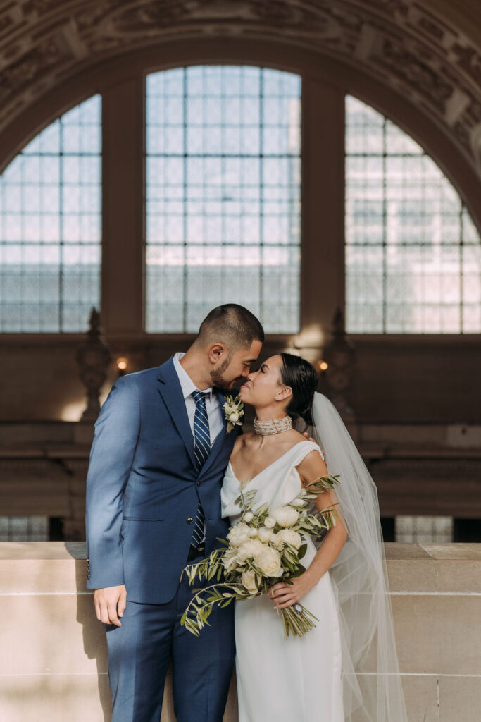 bride and groom at the gorgeous San Francisco city hall for their elopement