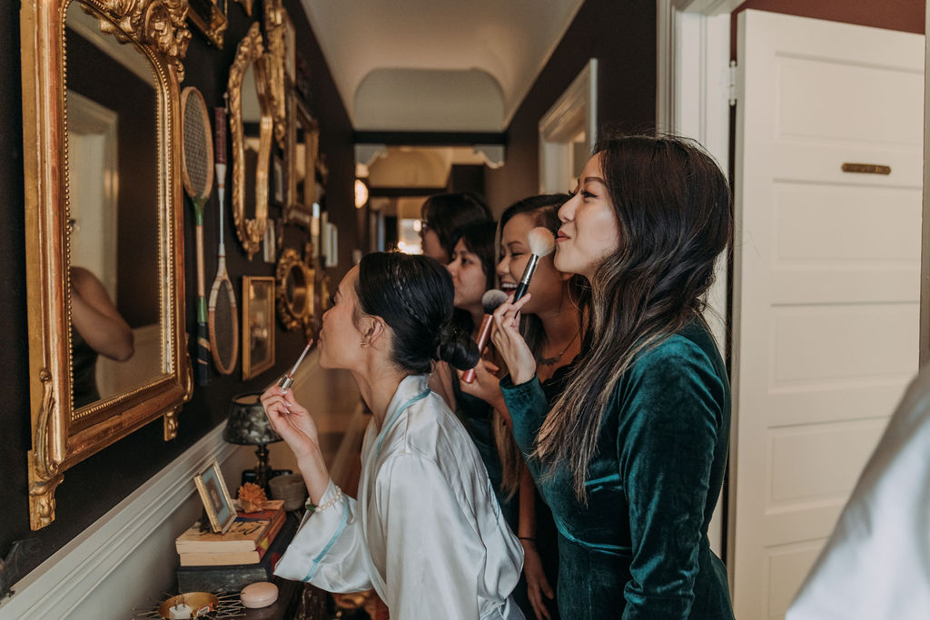 bride and bridesmaids getting ready