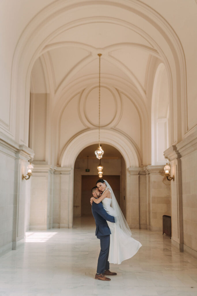 bride and groom at the gorgeous San Francisco city hall for their elopement