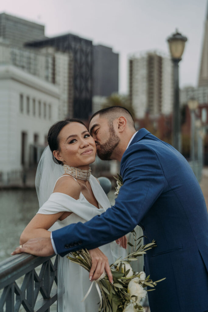 bride and groom on the pier in san francisco 