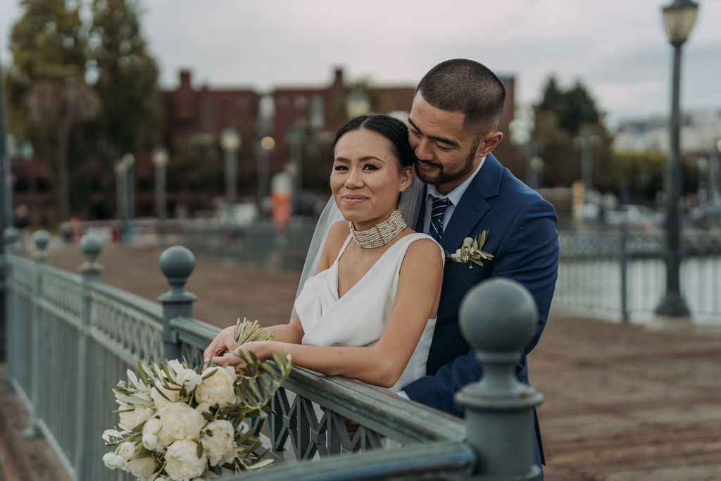 bride and groom on the pier in san francisco 