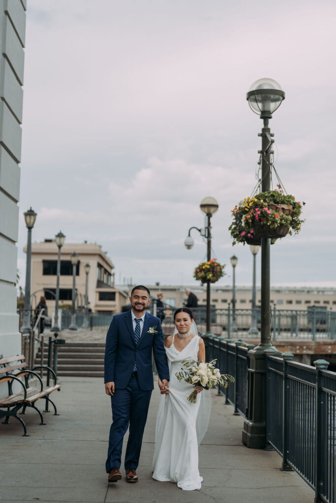 bride and groom on the pier in san francisco 